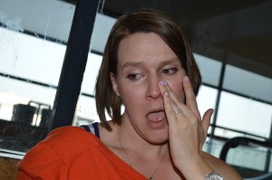 A photo my son took of me, crying and nursing a baby on the floor of the airport.